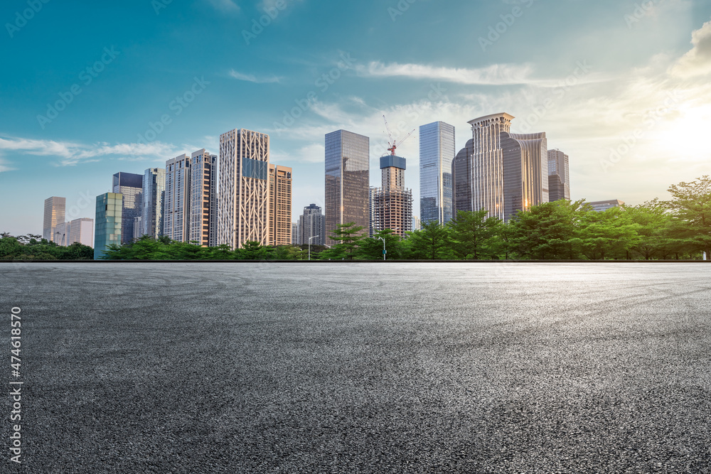 Empty asphalt road and modern urban commercial buildings in Shenzhen