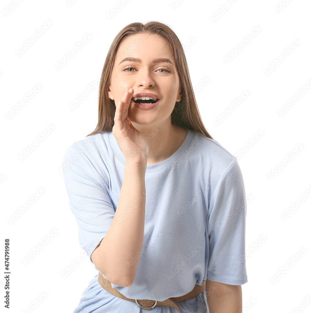 Young gossiping woman on white background