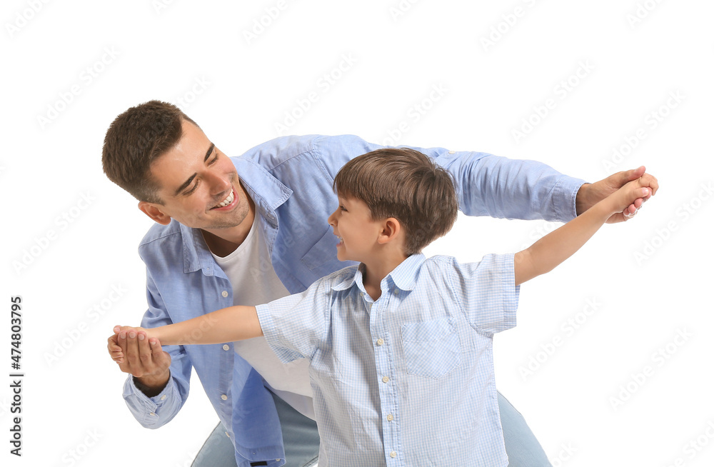 Dancing man and his little son on white background