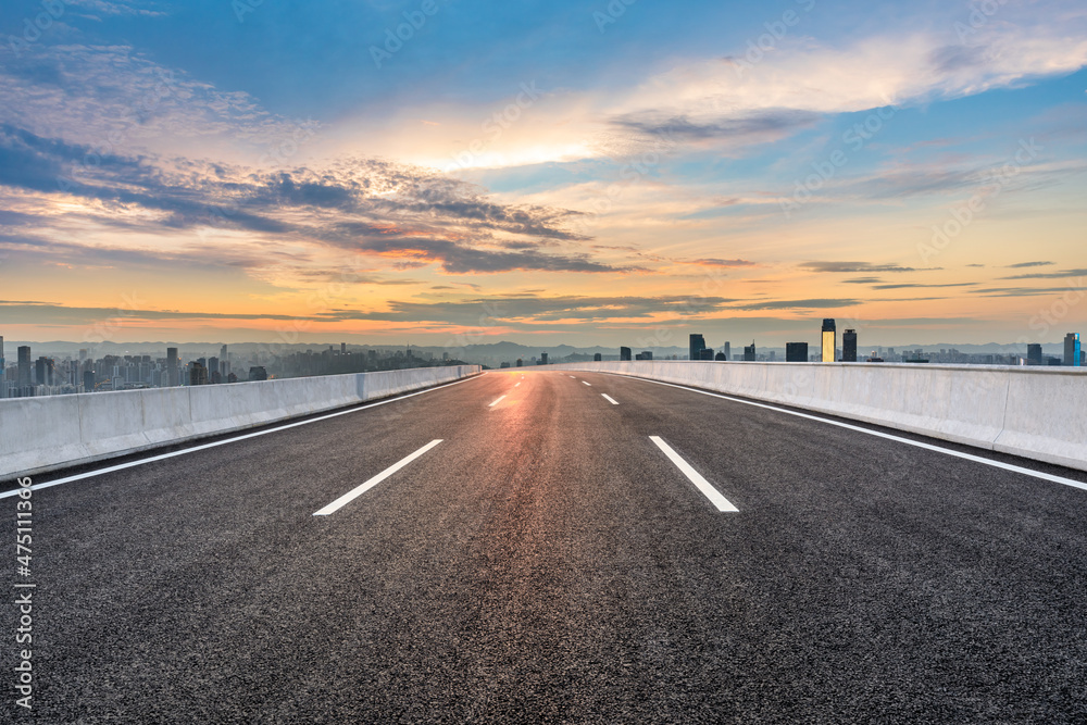 Panoramic skyline and buildings with empty road