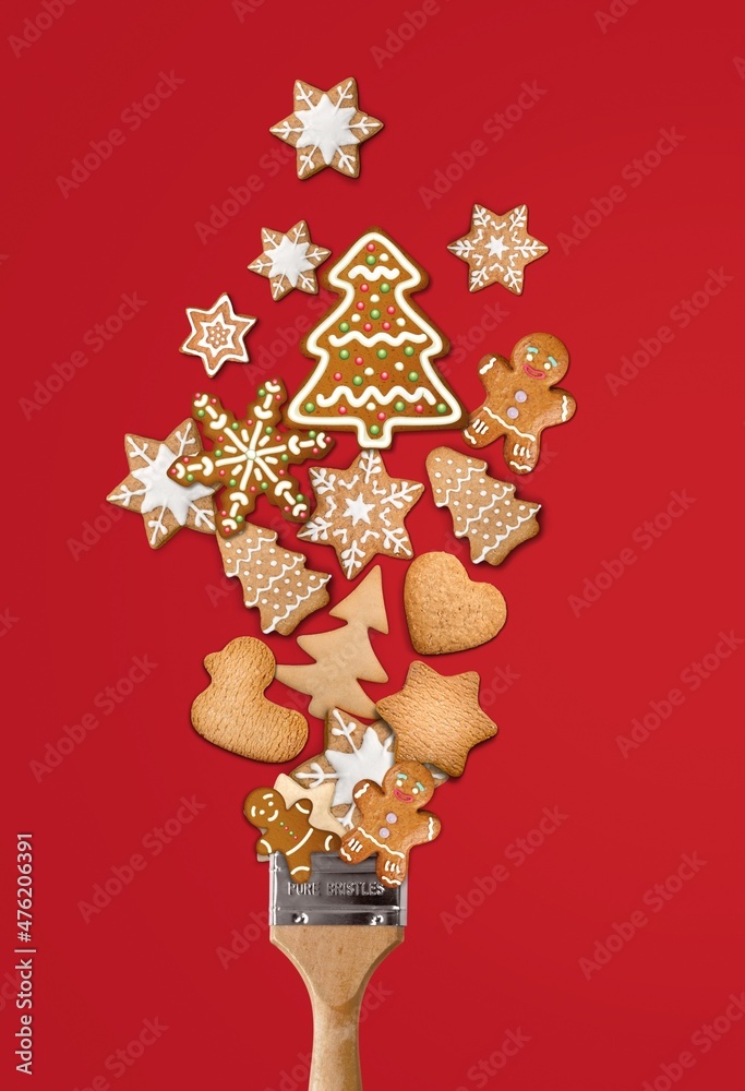 Creative Christmas concept composition. Paint brush with Holliday cookies