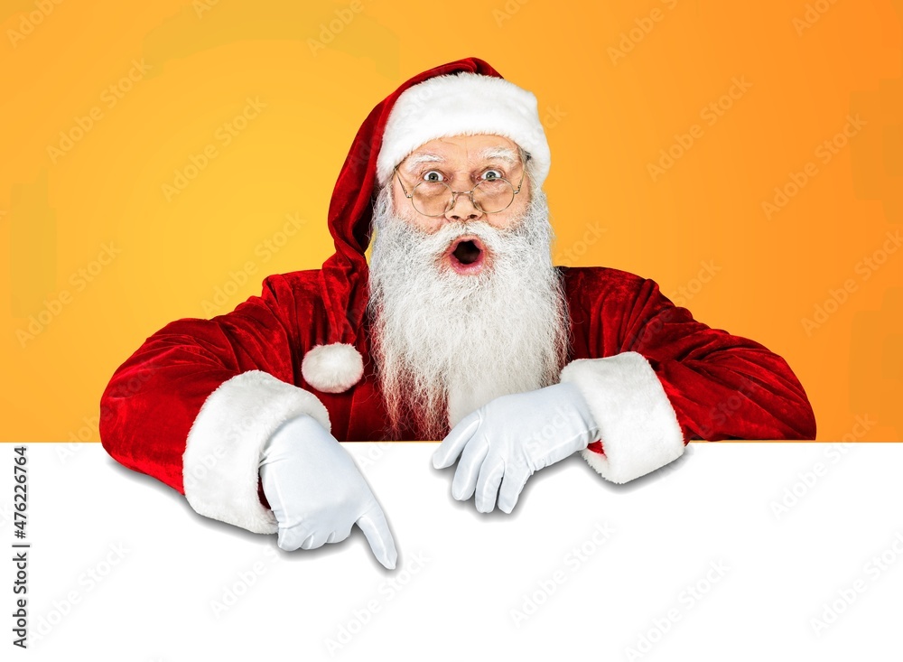 Photo astonished beard santa claus impressed x-mas Christmas adverts discount point finger copyspace