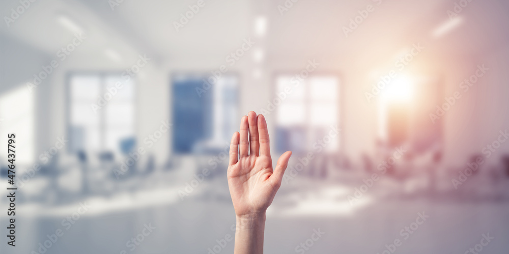 Choosing gesture of person in elegant modern interior in sunshine light