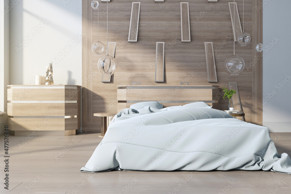 Contemporary bedroom interior with bright daylight, wooden flooring, furniture and decorative object