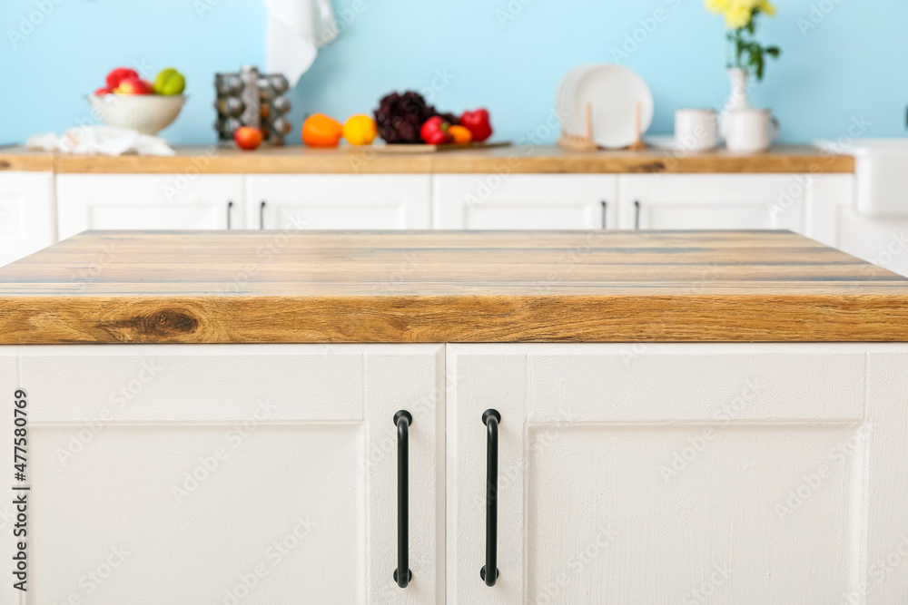 Wooden counter with empty table top in kitchen, closeup