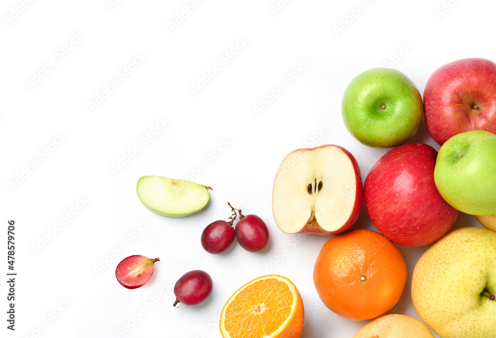 Flat lay of different fruits on white background.