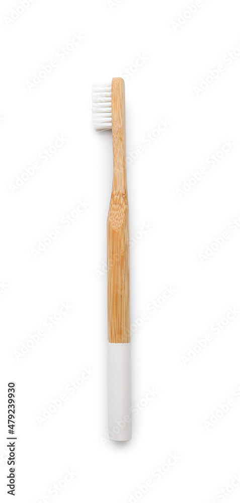 Bamboo toothbrush on white background