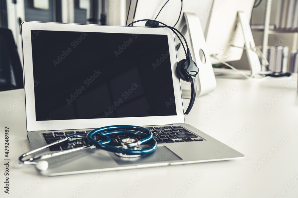 Headset and doctor equipment at clinic ready for actively support for patient by online video call .