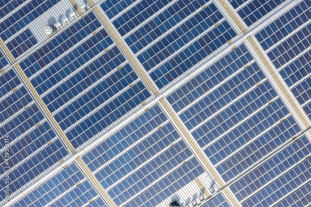 Solar panels on factory rooftop