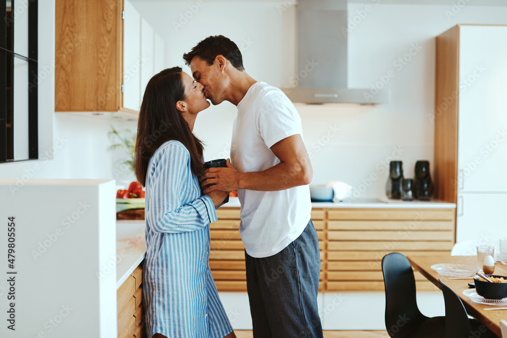 Couple kissing in the morning