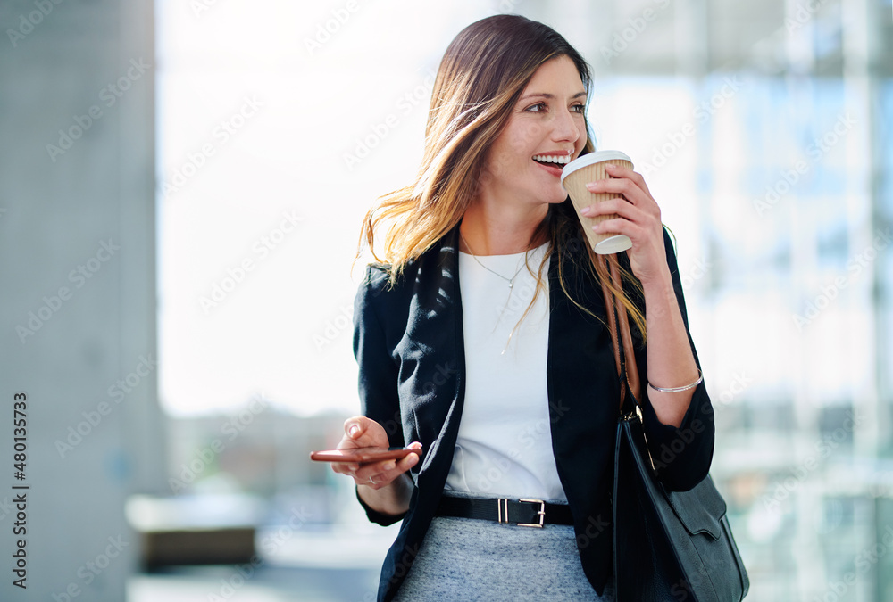 Start your morning with good ol caffeine. Cropped shot of an attractive young businesswoman drinkin