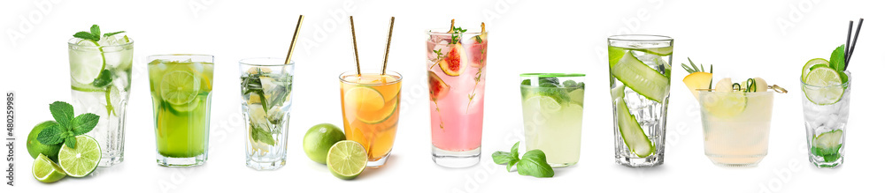 Assortment of fresh lemonade on white background