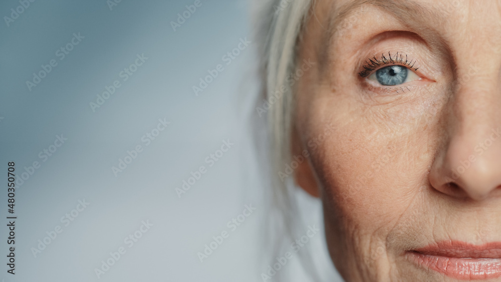 Close-up Shot of an Eyes of Beautiful Senior Woman Looking at Camera and Smiling Wonderfully. Gorgeo