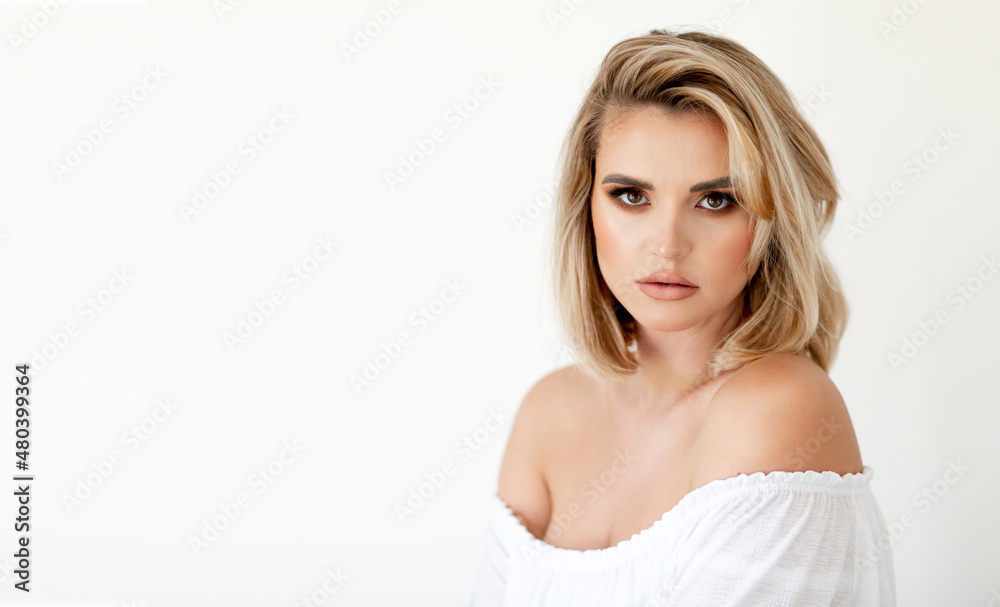 Pretty young lady with make up posing isolated