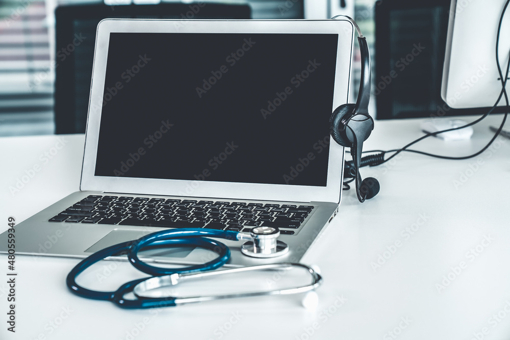 Headset and doctor equipment at clinic ready for actively support for patient by online video call .