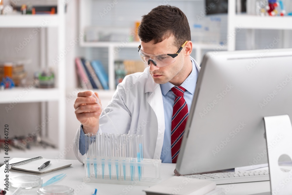 Medical Research Laboratory, Female Scientist Using Micro Pipette for Test Analysis.