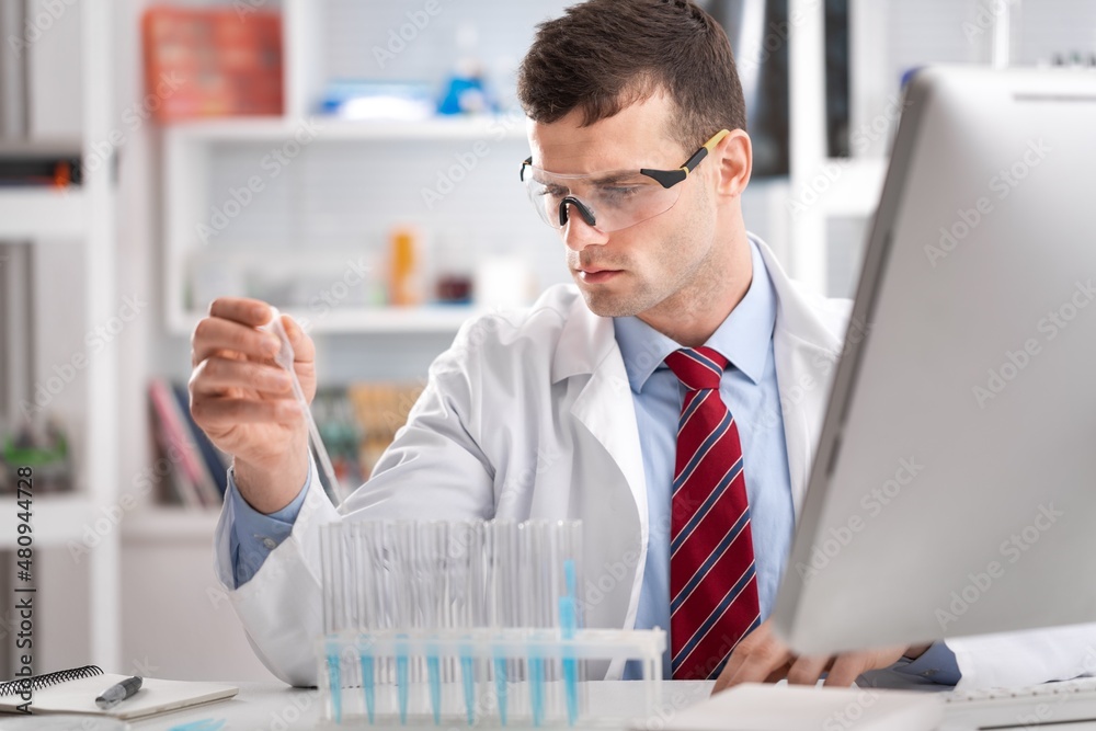 Medical Research Laboratory, Female Scientist Using Micro Pipette for Test Analysis.