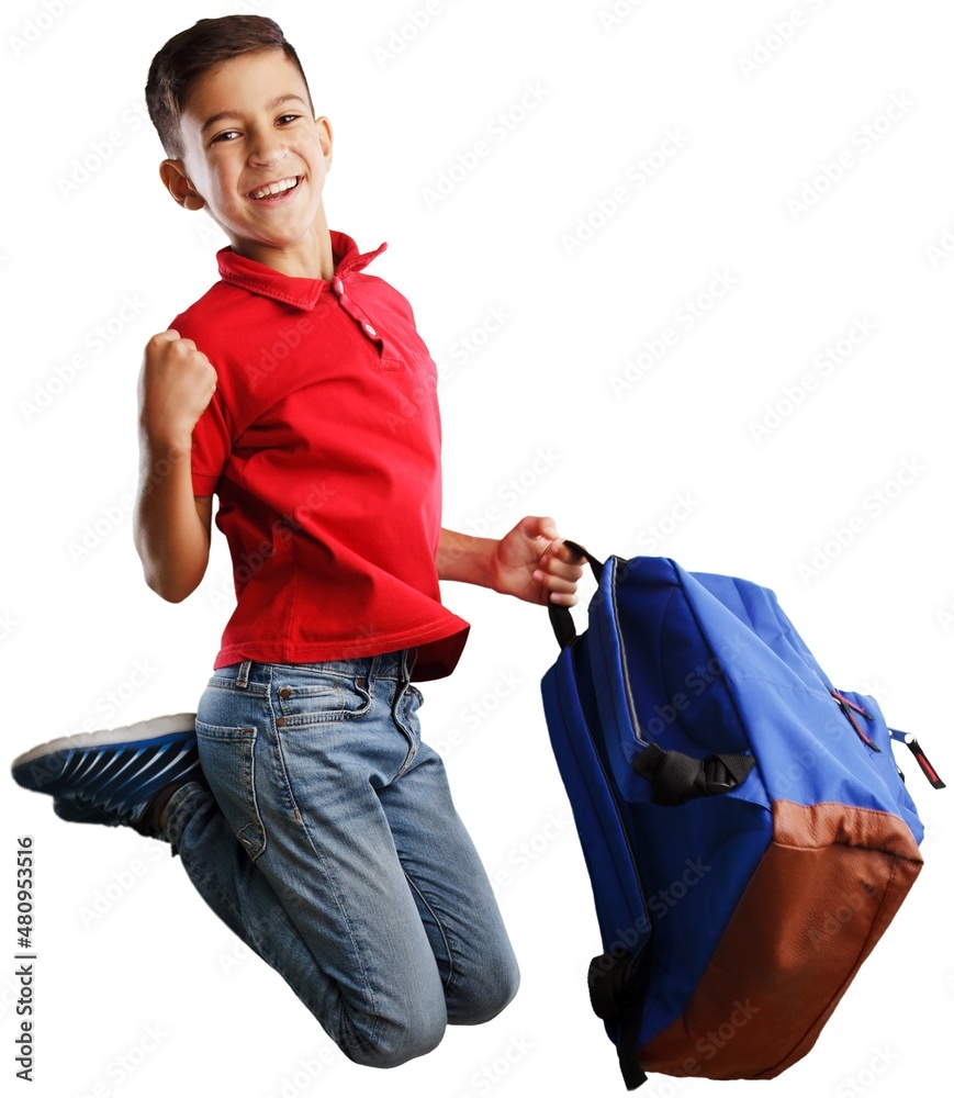 Happy young school child with backpack on background