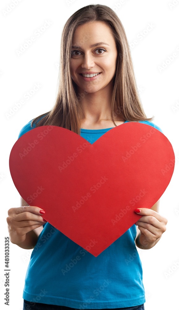 Beautiful lady holds red heart postcard invitation on background