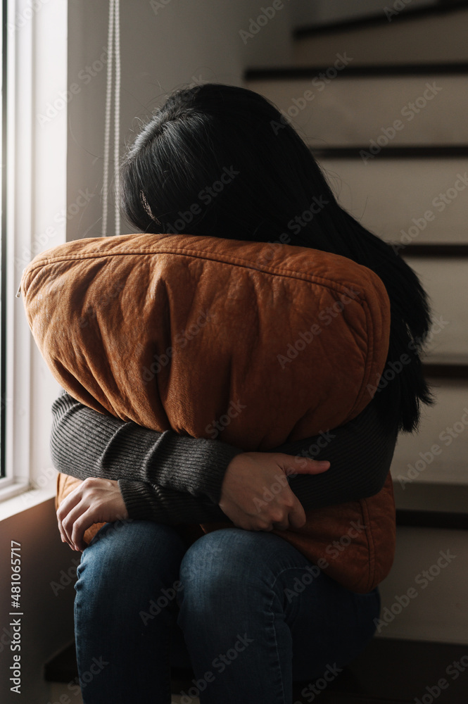  woman sit Depression Standing by window