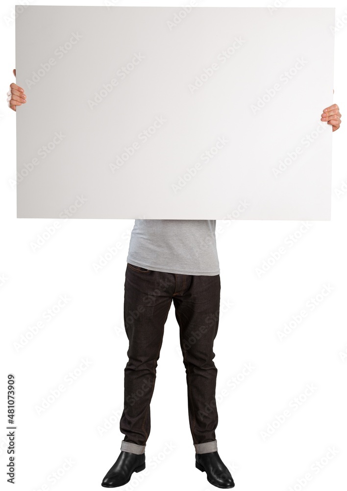 Young male holds a square canvas primed