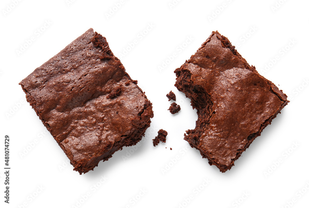 Pieces of tasty chocolate brownie isolated on white background