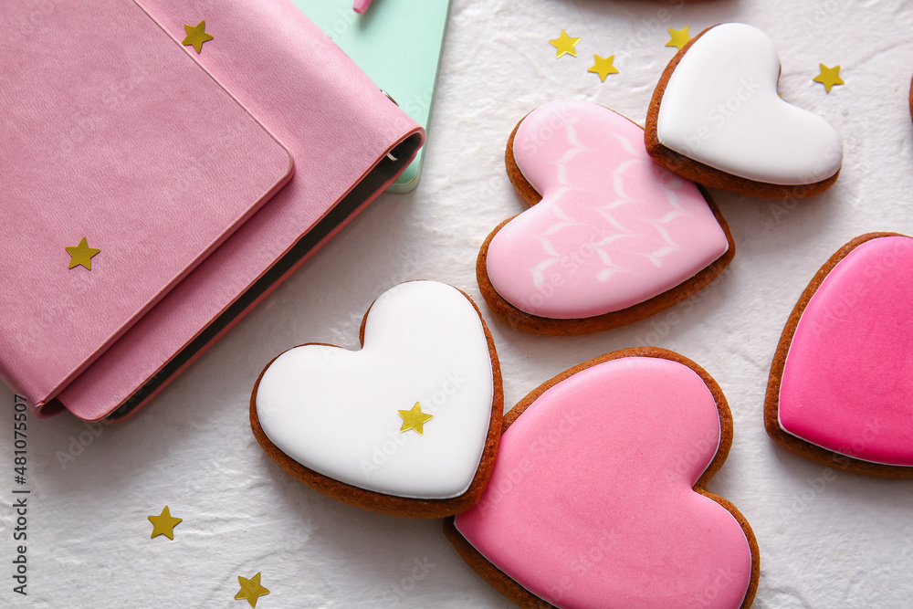 Tasty heart shaped cookies on white background, closeup