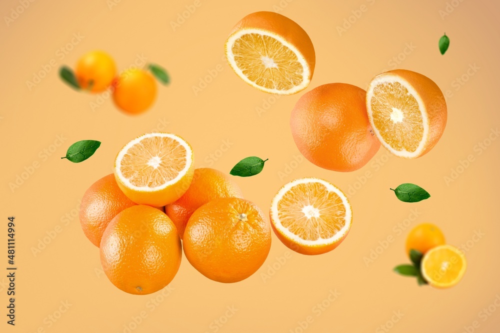 Stack of Orange falling or flying. Creative levitation food on color background