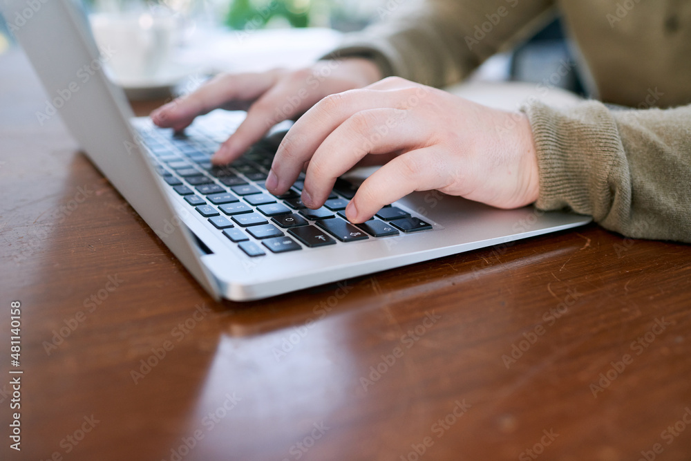 Start getting those deadlines done. Closeup shot of an unrecognisable businessman using a laptop in 