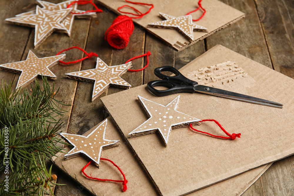 Beautiful handmade Christmas toys on wooden background