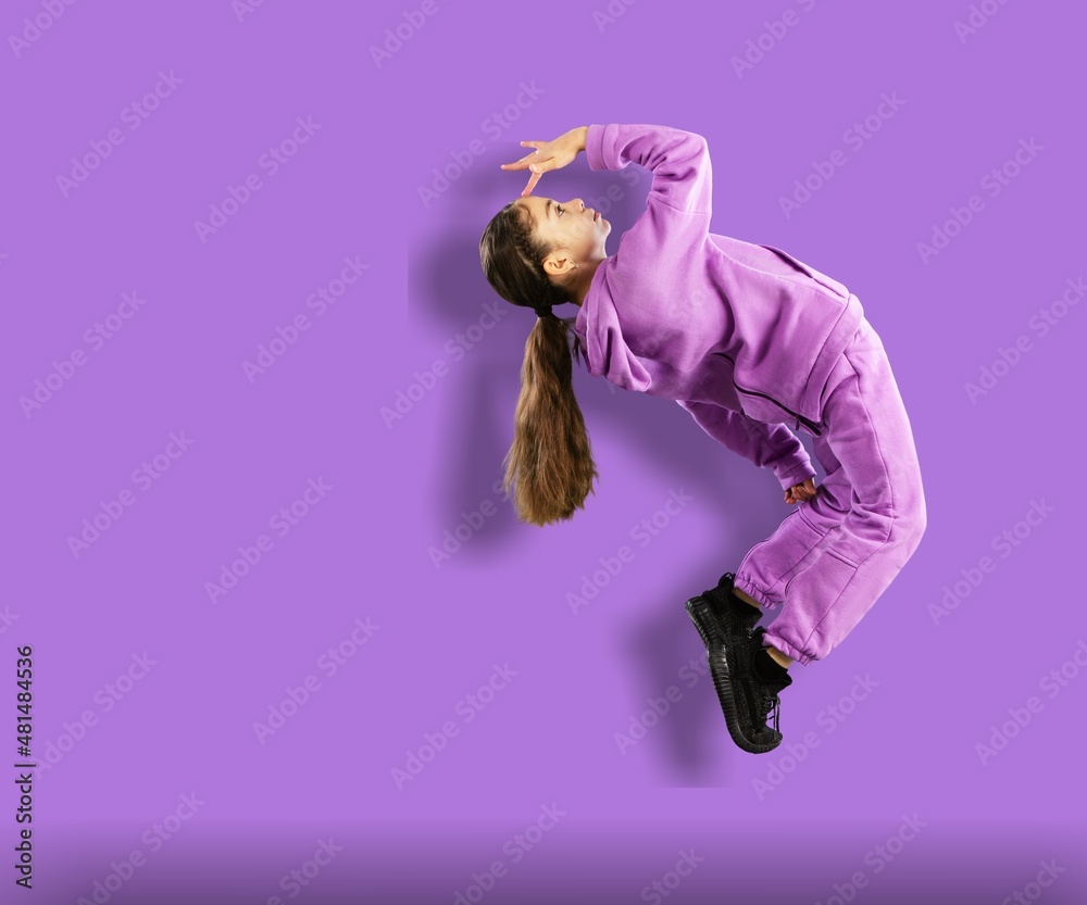 Young funny lady dance wear sport suit on  background