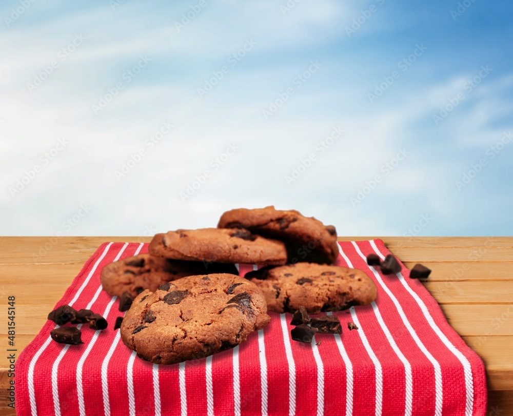 Heap of tasty sweet chip cookies on a table. Sweet breakfast.