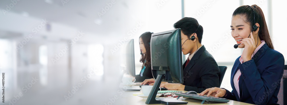 Business people wearing headset working in office in widen view to support remote customer or collea