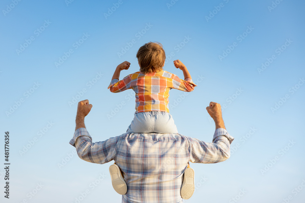 Grandfather and boy having fun outdoor