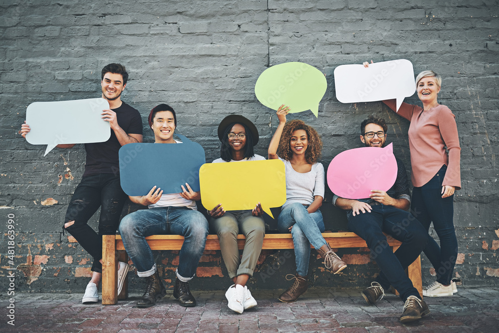 They putting their opinions out there. Shot of a diverse group of people holding up speech bubbles o