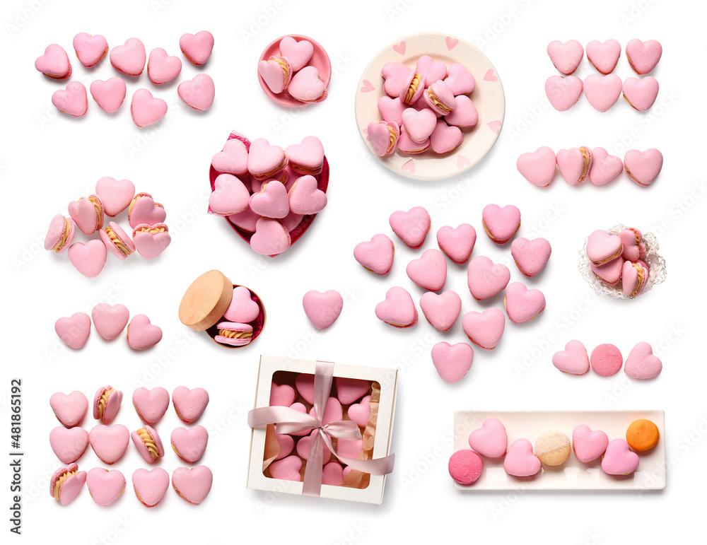 Tasty heart-shaped macaroons on white background, top view. Valentines Day celebration