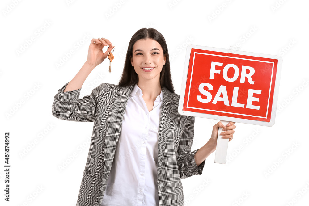 Female real estate agent with For Sale