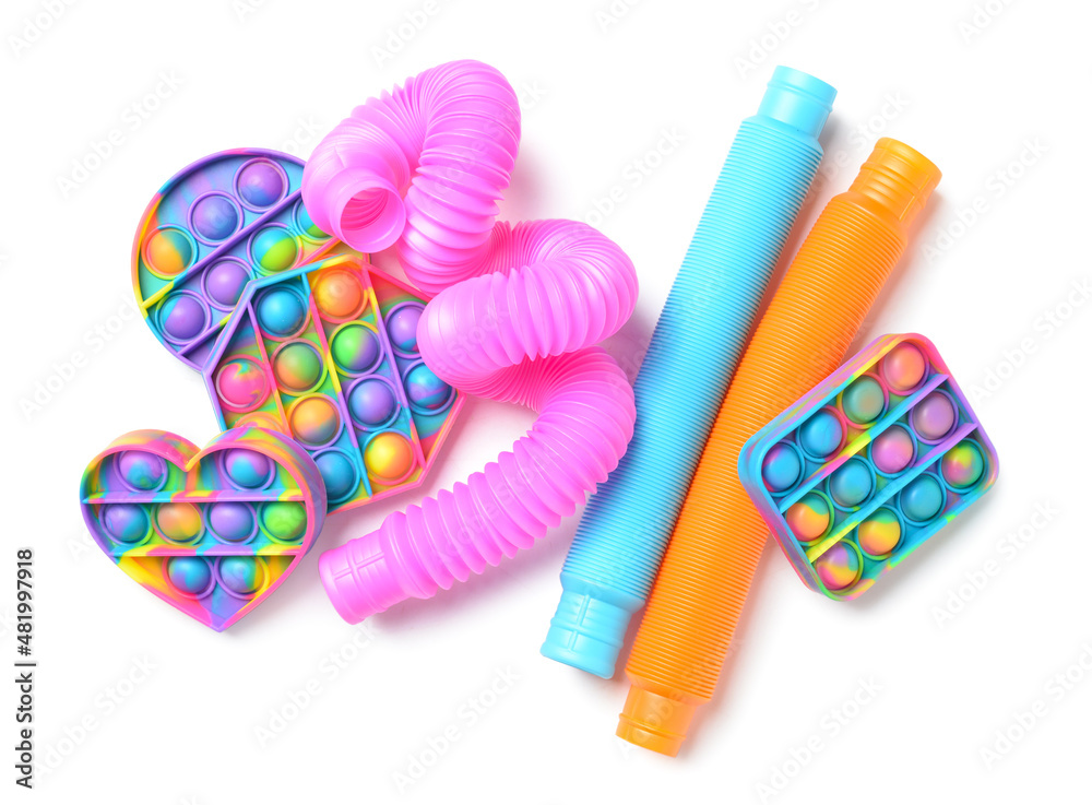 Colorful Pop Tubes and Pop it fidget toys on white background