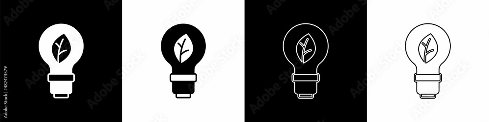 Set Light bulb with leaf icon isolated on black and white background. Eco energy concept. Alternativ