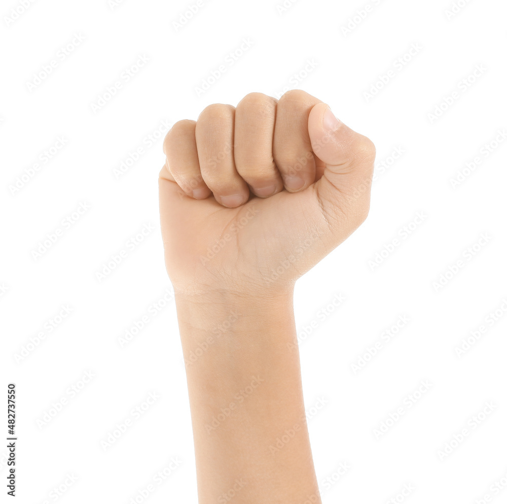 Child with clenched fist on white background