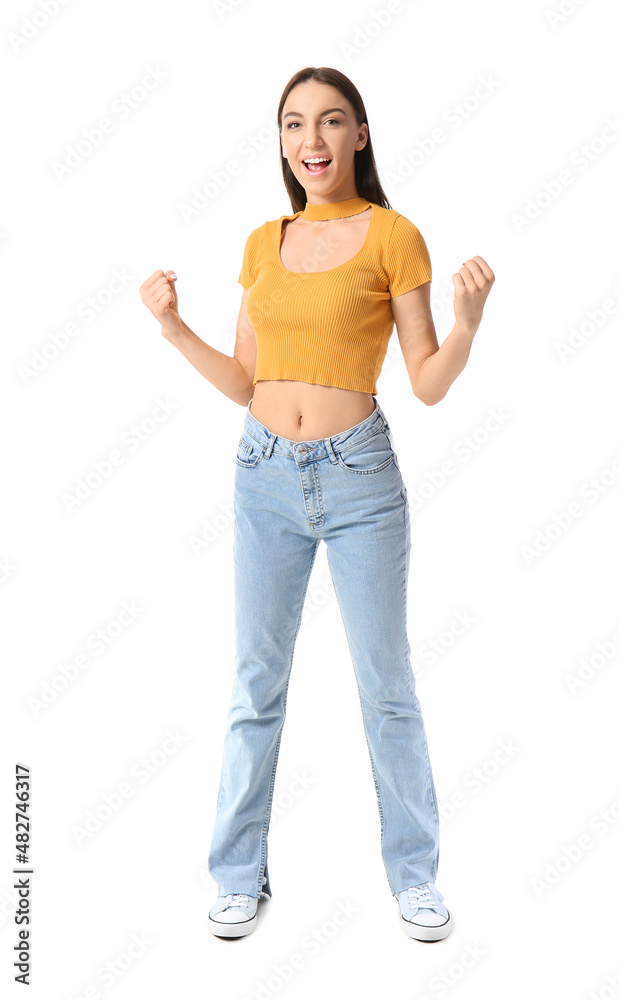 Happy young woman in yellow top on white background