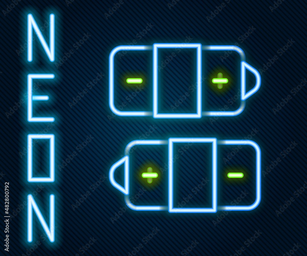 Glowing neon line Battery icon isolated on black background. Lightning bolt symbol. Colorful outline