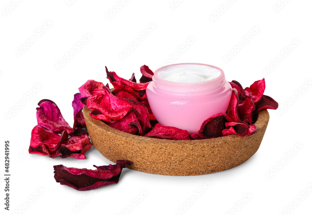 Jar with natural cosmetic cream and rose petals isolated on white background