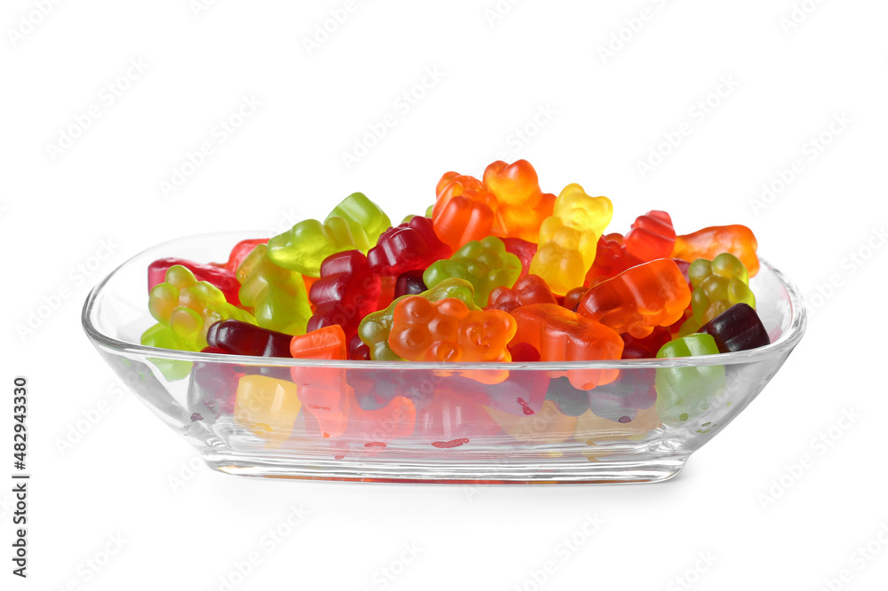 Bowl with tasty jelly bears on white background