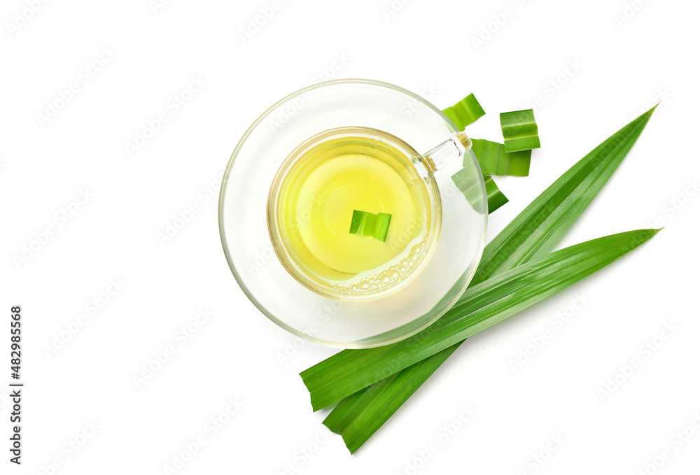 Pandan tea with fresh leaves isolated on white background.