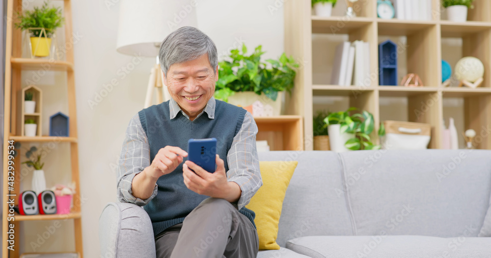 old man use mobile phone