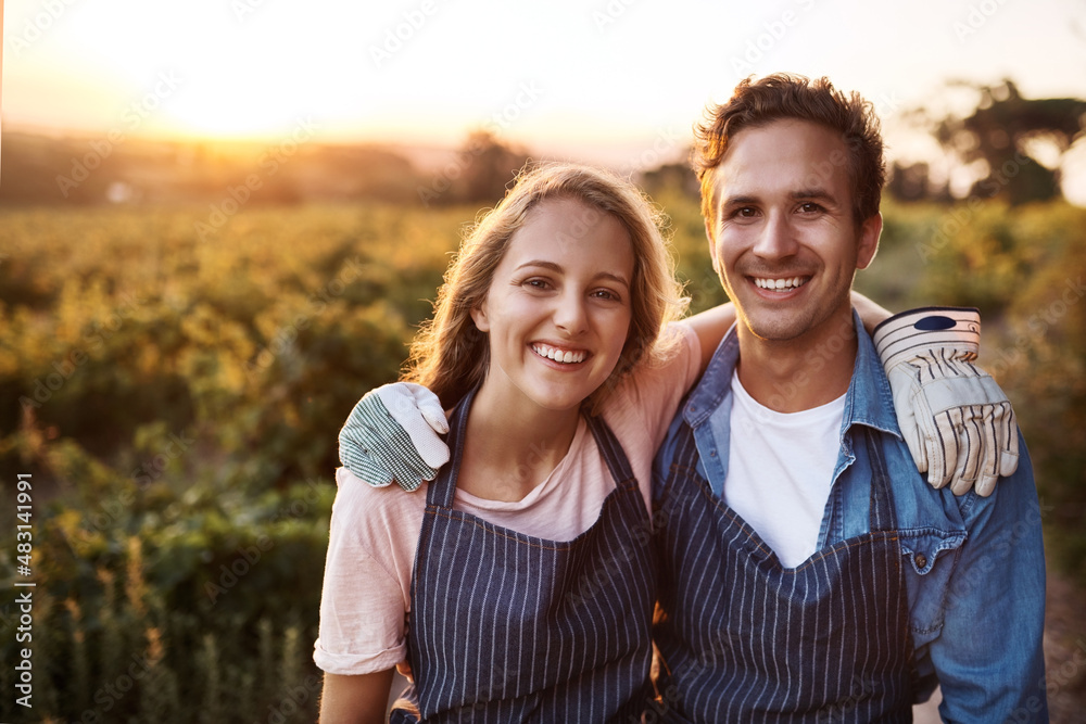 Farming is a labor of love. Portrait of a confident young man and woman working together on a farm.