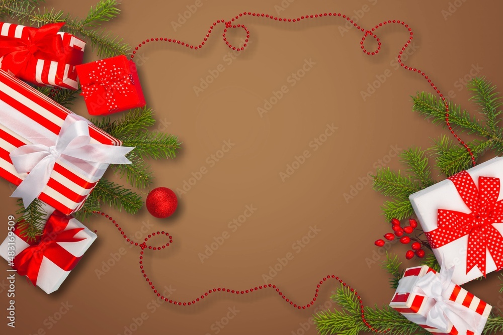 Gift wraped in craft paper and bow on background. Christmas gift box