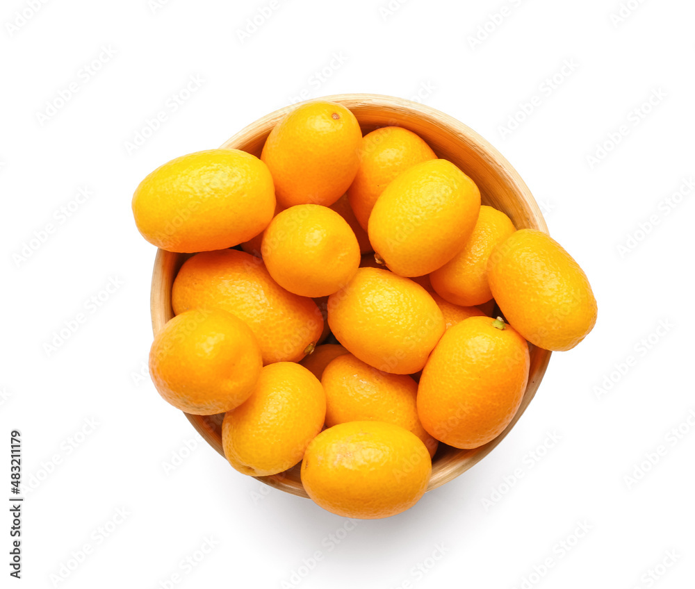 Bowl with tasty kumquat fruits on white background