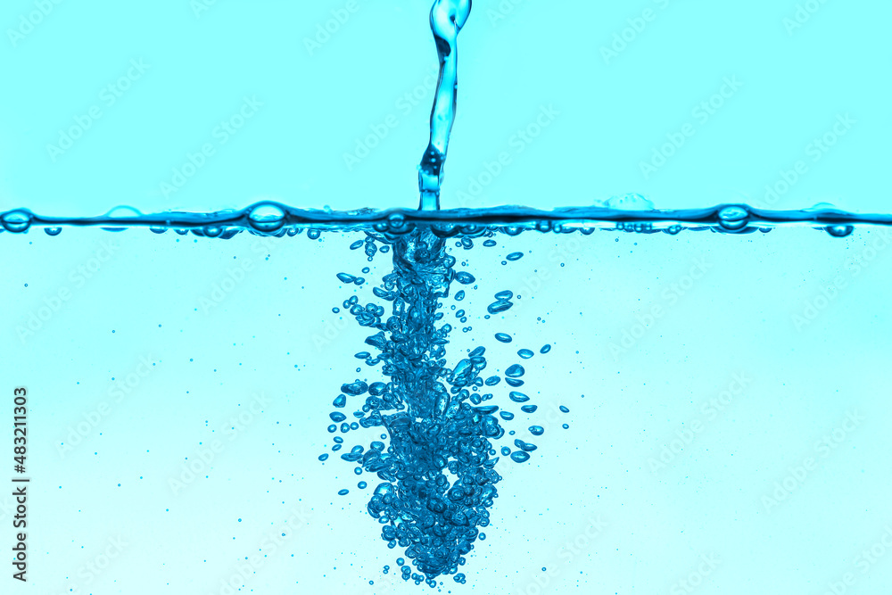 Clear water with air bubbles on blue background